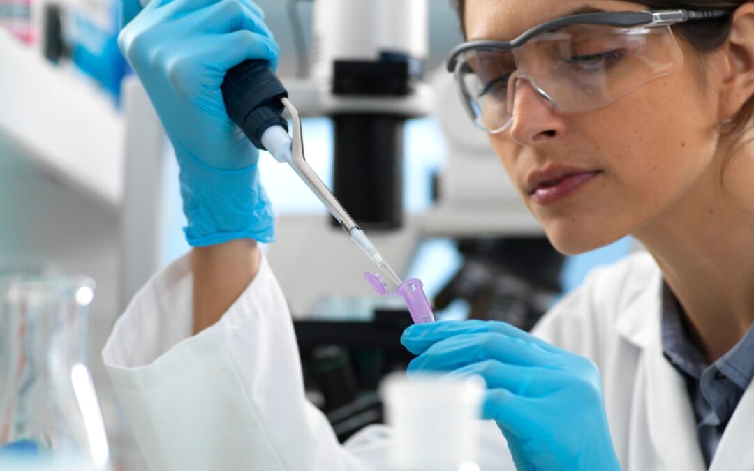 a medical professional preparing a sample