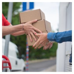 delivery man handing over boxes